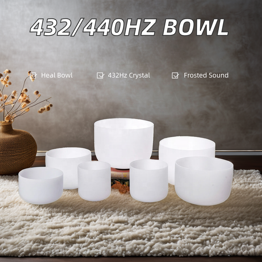 A person playing a purple frosted crystal singing bowl in a serene setting